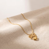 Elegant Gold Bow Heart Necklace